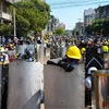 Người biểu tình tập trung tại thành phố Yangon, Myanmar ngày 8/3/2021. (Nguồn: AFP/TTXVN) 