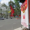 Băngrôn, khẩu hiệu tuyên truyền đã được treo ở các tuyến đường và địa điểm công cộng ở Cà Mau. (Ảnh: Minh Hưng/ TTXVN) 