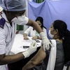 Nhân viên y tế diễn tập tiêm vaccine phòng COVID-19 tại bệnh viện ở Mumbai, Ấn Độ, ngày 8/1/2021. (Nguồn: THX/TTXVN) 