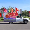 Các tuyến đường chính của thị xã Đông Hòa Phú Yên được trang trí cờ hoa rực rỡ tuyên truyền, chào mừng ngày bầu cử. (Nguồn: TTXVN phát) 