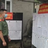 ​Nơi niêm yết danh sách ứng cử viên, danh sách cử tri tại một khu vực bỏ phiếu trên địa bàn xã Thống Nhất, huyện Hạ Lang, tỉnh Cao Bằng. (Ảnh: Chu Hiệu/TTXVN) 