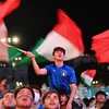 Cổ động viên đội tuyển Italy mừng chiến thắng trước đội tuyển Thụy Sĩ. (Nguồn: AFP/TTXVN) 