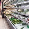 Nhóm hàng thực phẩm có sức mua tăng cao tại thị trường Thành phố Hồ Chí Minh. (Ảnh: Mỹ Phương/TTXVN) 