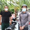 Hai đối tượng Trần Thanh Ngọc và Nguyễn Mạnh Hoài bị bắt giữ. (Ảnh: Thanh Tâ/TTXVN phát) 