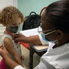 Một em nhỏ 3 tuổi được tiêm vaccine ngừa COVID-19 tại La Habana, Cuba ngày 24/8/2021. (Ảnh: AFP/TTXVN) 