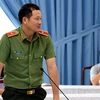 Thiếu tướng Vũ Hồng Văn thông tin về việc khởi tố đối tượng mạo danh Vụ trưởng Thanh tra Chính phủ. (Ảnh: Công Phong/TTXVN) 