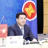 Bộ trưởng Công Thương Nguyễn Hồng Diên tham dự hội nghị và phát biểu tại điểm cầu Hà Nội. (Ảnh: Trần Việt/TTXVN) 