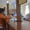 Bảo hiểm Xã hội tỉnh Đắk Lắk hỗ trợ xác nhận cho doanh nghiệp, người lao động dừng việc hoặc dừng đóng bảo hiểm xã hội để được thụ hưởng chính sách theo Nghị quyết 68. (Ảnh: Hoài Thu/TTXVN) 