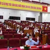 100% đại biểu biểu quyết thông qua các nghị quyết tại Kỳ họp thứ tư Hội đồng nhân dân tỉnh Lai Châu khóa XV, nhiệm kỳ 2021-2026. (Ảnh: Quý Trung/TTXVN) 