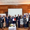 Các quan khách và cộng đồng doanh nghiệp tham dự Diễn đàn tại Zurich ngày 21/10. (Ảnh: Tố Uyên/TTXVN) 
