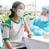 Hình ảnh những học sinh đầu tiên ở Việt Nam tiêm vaccine COVID-19