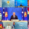 Thủ tướng Australia Scott Morrison (giữa) dự Hội nghị cấp cao ASEAN-Australia lần thứ nhất theo hình thức trực tuyến, ngày 27/10/2021. (Ảnh: AFP/TTXVN) 