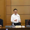 Bộ trưởng Bộ Tài chính Hồ Đức Phớc, đại biểu Quốc hội tỉnh Bình Định, phát biểu ý kiến tại buổi thảo luận ở tổ về dự án Luật Kinh doanh bảo hiểm (sửa đổi). (Ảnh: Doãn Tấn/TTXVN) 