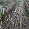 [Photo] Hà Nội: Đường vành đai 3 ùn tắc dù đã qua giờ cao điểm