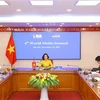 Đoàn đại biểu Thông tấn xã Việt Nam do Tổng giám đốc Vũ Việt Trang dẫn đầu tham dự Hội nghị tại điểm cầu Hà Nội. (Ảnh: Văn Điệp/TTXVN) 