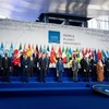 Các đại biểu chụp ảnh chung tại Hội nghị thượng đỉnh Nhóm các nền kinh tế phát triển và mới nổi hàng đầu thế giới (G20) ở Rome, Italy ngày 30/10/2021. (Ảnh: AFP/TTXVN) 