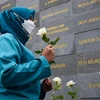 Lễ tưởng niệm các nhân viên y tế tử vong do COVID-19 tại Bandung, Indonesia, ngày 4/12/2021. (Ảnh: AFP/TTXVN) 