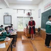 Trường Trung học cơ sở Quang Trung đón học sinh hai khối 7,9 đến trường. (Ảnh: Bích Huệ/TTXVN) 