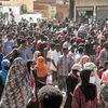 Người dân tham gia biểu tình yêu cầu chuyển tiếp sang chính quyền dân sự tại Sahafa, ngoại ô Khartoum, Sudan, ngày 25/12/2021. (Ảnh: AFP/TTXVN) 