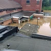 Những ngôi nhà bị chìm trong nước lũ ở Liege, Bỉ ngày 15/7/2021. (Ảnh: THX/TTXVN) 