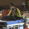 Bệnh nhân COVID-19 được điều trị tại bệnh viện dã chiến ở New Delhi, Ấn Độ. (Ảnh: AFP/TTXVN) 
