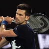Tay vợt Novak Djokovic tập luyện tại thành phố Melbourne, Australia ngày 14/1/2022. (Ảnh: AFP/TTXVN) 