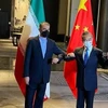 Bộ trưởng Ngoại giao Trung Quốc Vương Nghị (phải) và người đồng cấp Iran Hossein Amir Abdollahian. (Nguồn: iranintl.com) 