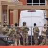 Các thành viên SWAT triển khai gần giáo đường Do Thái ở Colleyville, Texas. (Nguồn: AFP) 