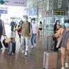 Hành khách tại sân bay Đà Nẵng. (Ảnh: Trần Lê Lâm/TTXVN) 