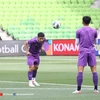 Các cầu thủ đội tuyển Việt Nam tập luyện trước trận lượt về gặp đội tuyển Australia. (Ảnh: TTXVN phát) 