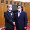 Thủ tướng Phạm Minh Chính với Đại sứ Hùng Ba trong một cuộc gặp. (Ảnh: Dương Giang/TTXVN) 