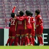 Niềm vui của cầu thủ nữ Việt Nam sau khi đoạt vé lịch sử dự vòng chung kết World Cup. (Ảnh: TTXVN/phát) 