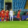 Các cầu thủ đội tuyển Việt Nam ăn mừng sau bàn thắng mở tỷ số của Hồ Tấn Tài (13) ở phút thứ 9 vào lưới đội tuyển Trung Quốc. (Ảnh: Tuấn Anh/TTXVN) 