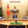 Thủ tướng Phạm Minh Chính chủ trì họp về điều chỉnh Chương trình xây dựng luật, pháp lệnh năm 2022. (Ảnh: Dương Giang/TTXVN) 