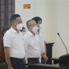 Ba bị cáo Lê Anh Dũng, Phan Bùi Bảo Thi và Nguyễn Huy tại phiên tòa xét xử sơ thẩm vụ án 'Lợi dụng các quyền tự do dân chủ xâm phạm quyền, lợi ích hợp pháp của cá nhân. (Ảnh: Thanh Thủy/TTXVN) 