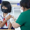 Tiêm vaccine cho trẻ em ở Bình Thuận. (Ảnh: Hồng Hiếu/TTXVN) 