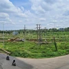 Phần đất nền ở Khu dân cư A1-C1 chưa được phép bán nhưng Công ty trách nhiệm hữu hạn Đầu tư Phú Việt Tín đã bán cho hàng trăm người dân. (Ảnh: TTXVN phát) 