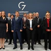 Bộ trưởng khí hậu, môi trường và năng lượng các nước G7 chụp ảnh chung tại hội nghị ở Berlin, Đức ngày 26/5/2022. (Ảnh: AFP/TTXVN) 