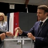 Tổng thống Pháp Emmanuel Macron tới bỏ phiếu bầu cử Quốc hội vòng hai, ở Le Touquet, miền Bắc Pháp, ngày 19/6/2022. (Ảnh: AFP/TTXVN) 