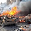 Hiện trường một vụ đánh bom tại Raqqa, Syria. (Ảnh: Basnews/TTXVN) 