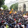 Người biểu tình xông vào Phủ Tổng thống ở thủ đô Colombo ngày 9/7/2022, yêu cầu Tổng thống Gotabaya Rajapaksa từ chức vì đã để đất nước rơi vào cuộc khủng hoảng kinh tế tồi tệ nhất trong 7 thập kỷ qua. (Ảnh: AFP/TTXVN) 
