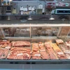Thịt lợn được bày bán tại một cửa hàng (Nguồn: AFP/TTXVN) 