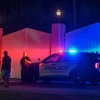 Xe cảnh sát đậu bên ngoài nhà riêng của cựu Tổng thống Mỹ Donald Trump tại Mar-A-Lago, Palm Beach, bang Florida, Mỹ, ngày 8/8/2022. (Ảnh: AFP/TTXVN) 
