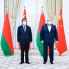 Chủ tịch Trung Quốc Tập Cận Bình và Tổng thống Belarus Alexander Lukashenko. (Nguồn: Xinhua) 