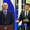 Tổng thống Nga Vladimir Putin (trái) và Tổng thống Ukraine Volodymyr Zelensky. (Ảnh: AFP/TTXVN) 