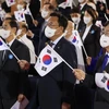 Thủ tướng Hàn Quốc Han Duck-soo (trái) cùng các quan chức tham dự lễ kỷ niệm Ngày lập quốc, tại Seoul ngày 3/10/2022. (Ảnh: Yonhap/TTXVN) 