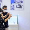 Trải nghiệm các công nghệ tại Trung tâm Hợp tác Đào tạo Việt-Hàn thuộc Khu công nghệ cao Thành phố Hồ Chí Minh. (Ảnh: TTXVN phát) 