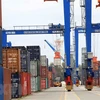 Hoạt động bốc xếp hàng nhập khẩu tại cảng biển Hải Phòng. (Ảnh: An Đăng/TTXVN) 