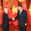 Tổng Bí thư, Chủ tịch nước Trung Quốc Tập Cận Bình đón Tổng Bí thư Nguyễn Phú Trọng trong chuyến thăm Trung Quốc hồi tháng 1/2017. (Ảnh: Trí Dũng/TTXVN)