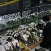 Người dân tưởng niệm các nạn nhân thiệt mạng trong vụ giẫm đạp tại Itaewon, Seoul, Hàn Quốc. (Ảnh: The New York Times/TTXVN) 